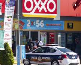 Resultado de imagen para Asaltan tienda de Oxxo en Apizaco, roban vino